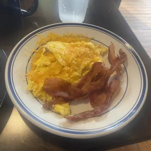 Eggs and bacon ordered with the pancake combo