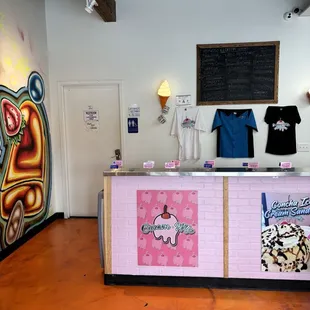 Ice cream freezer and T-shirts for sale