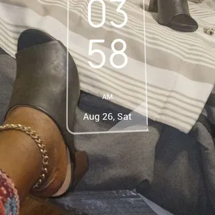 a woman&apos;s legs and shoes