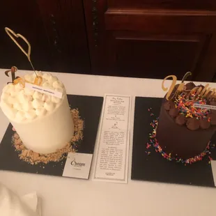 The White Chocolate Raspberry and S&apos;mores cake flavors and the custom decorations made these unique and personal.