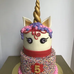 Unicorn cakes have been very popular in 2017 and 2018! This one was fun and whimsical for a 5-year-old's big day!