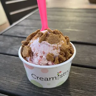 a cup of ice cream on a table