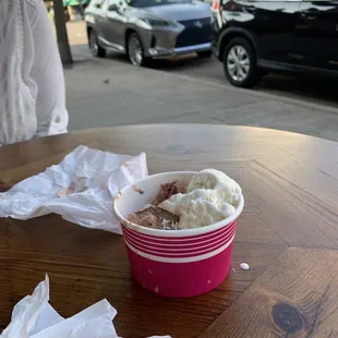a cup of ice cream on a table