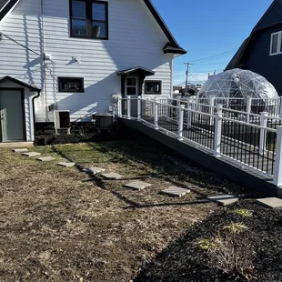 Parking at back and ramp to back entrance.