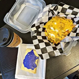 a sandwich and a cup of coffee