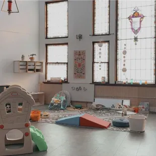 Indoor play space, curiosity approach allowing Child-led play. Adult child play!