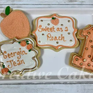 a plate of decorated cookies