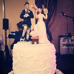 This was the top of our wedding cake. My husband is a soccer player so this was only right to add