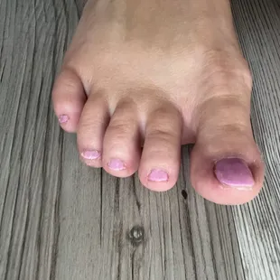 Horrible pedicure. Jagged edges, very sloppy polish.