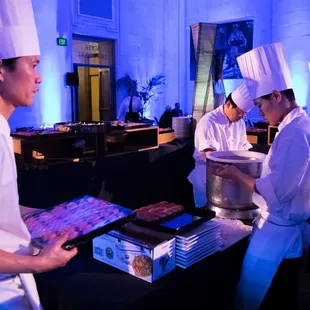 chefs preparing food