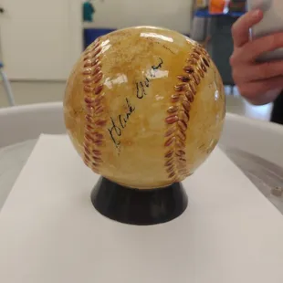 An old baseball with signatures figure!
