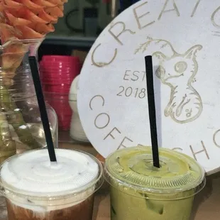 Vanilla espresso spritzer with cold foam, matcha latte