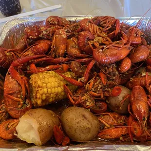 3lbs of crawfish kaboom spicy, potatoes, corn and two eggs.