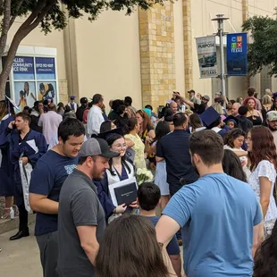 Everyone meeting their graduates outside for that requisite photo op