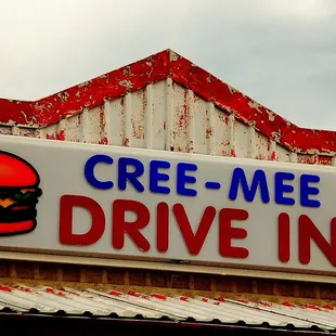 a sign for a drive - in