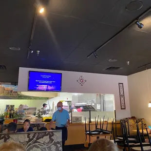 a man standing at the counter