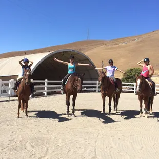 Group lesson in the outdoor jumping arena
