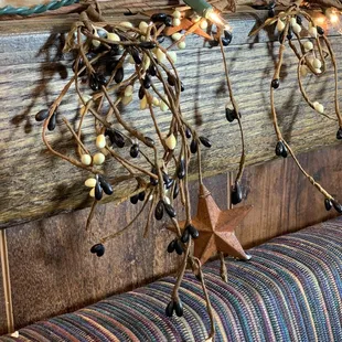 a wooden star and string of lights