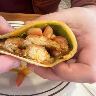 Buffalo chicken wrap half eaten because it was too good to wait!