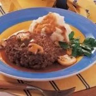 Blue plate special! Hamburger steak with gravy and mashed potatoes.