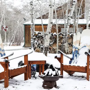 Mt. Yale's patio with firepit covered in a dusting of spring snow.