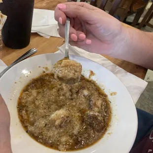 Shrimp and grits ok needed the grease taken off the top..