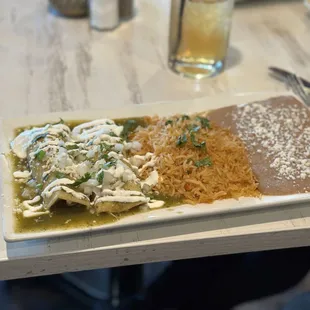 Tasty green chicken enchiladas.