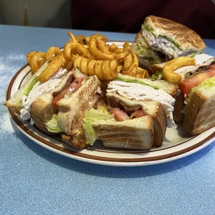 Club sandwich and curly fries