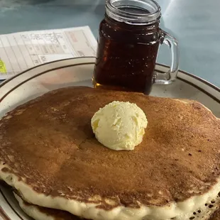 PANCAKES WITH A JAR OF SYRUP