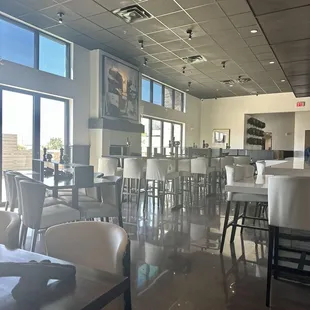 High top bar area/fireplace. Everything here is sleek, modern, and feels high end.