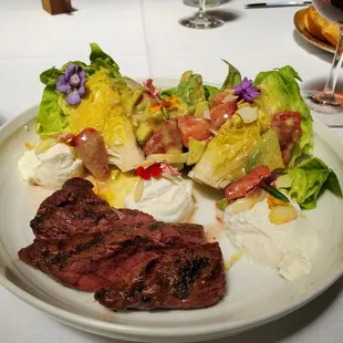 Delicious Strawberry Rhubarb Salad. Very refreshing. I added the Hanger Streak Medium Rare. Good size portion. Great Spring entre w/flowers