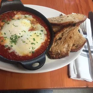 Brunch- pergatorio (hearty Italian tomato stew) with baked eggs