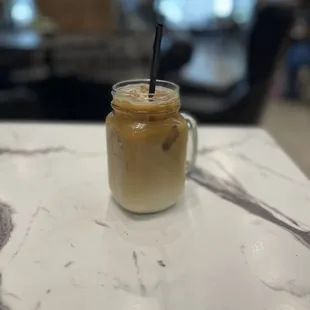 Iced latte with oat milk and sf vanilla