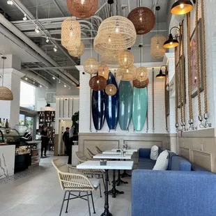 Interior of shop. Back left is entrance to open-to-outside sunny courtyard - lots of tables with umbrellas to nosh in the Miami sun!