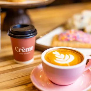 a cup of coffee and a plate of pastries