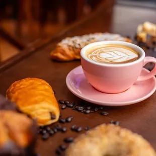 a cup of coffee and pastries