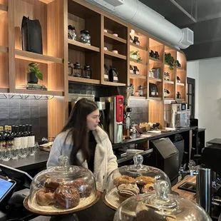 a woman sitting at a counter