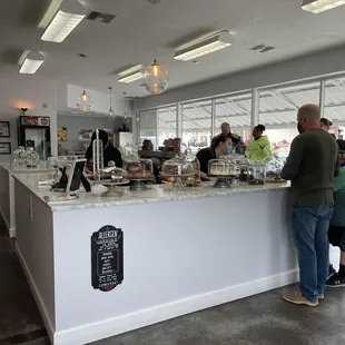 a group of people at a counter