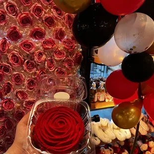 a person holding a box of roses