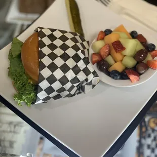 1/3 pound  all Angus beef cheeseburger with side of fresh fruit