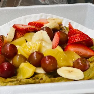 a plate of fruit salad