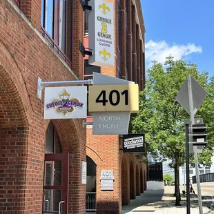 a brick building with a sign that reads 401