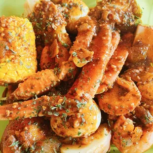 a plate of seafood and corn
