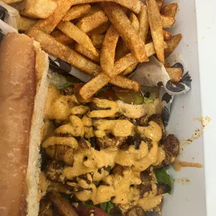 Blackened Chicken Po Boy and fries