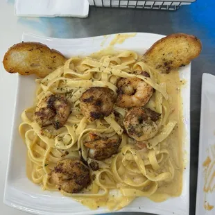 Creole Bleu Pasta. Grilled shrimp, Crawfish tails and Crab meat.