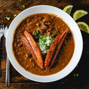 a bowl of beans and sausage