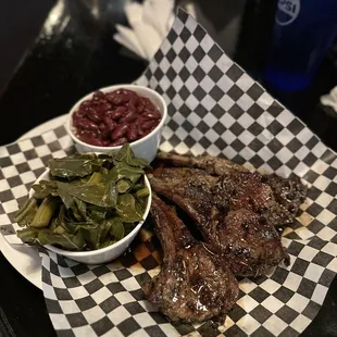 Lamb chops, greens, red beans and rice.