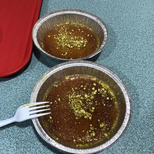 two bowls of food on a table