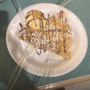 Strawberry and blueberry Nutella crepe with ice cream