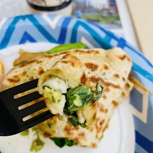 a plate of food with a fork